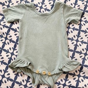 Kate Quinn Ruffle Leg Onesie